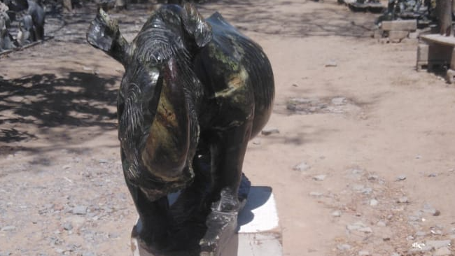 Rhino - Stone Sculpture Made of Leopard Rock by Ronny Nyamhunga | Zimbabwe