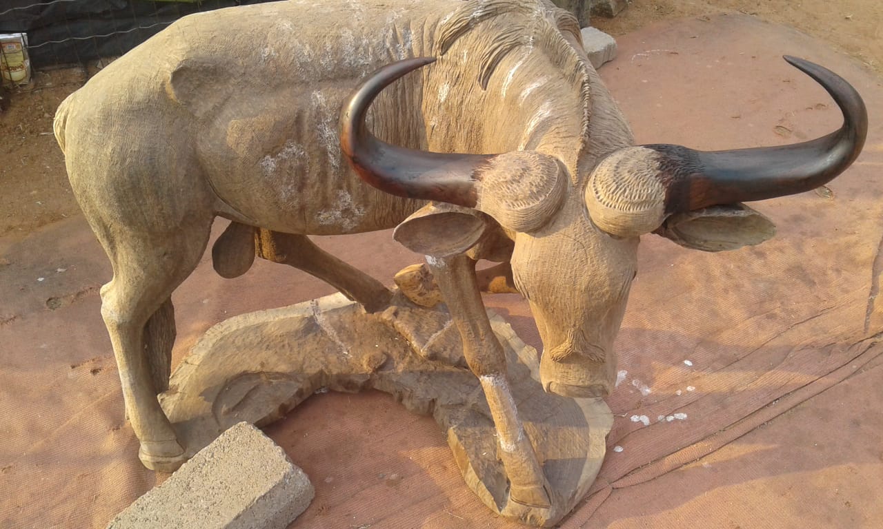 The Buffalo Collection - Carved from Ironwood by Killian Torovasei | Zimbabwe