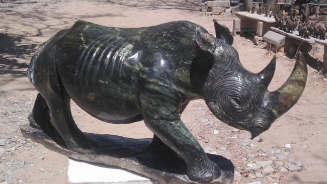 Rhino - Stone Sculpture Made of Leopard Rock by Ronny Nyamhunga | Zimbabwe