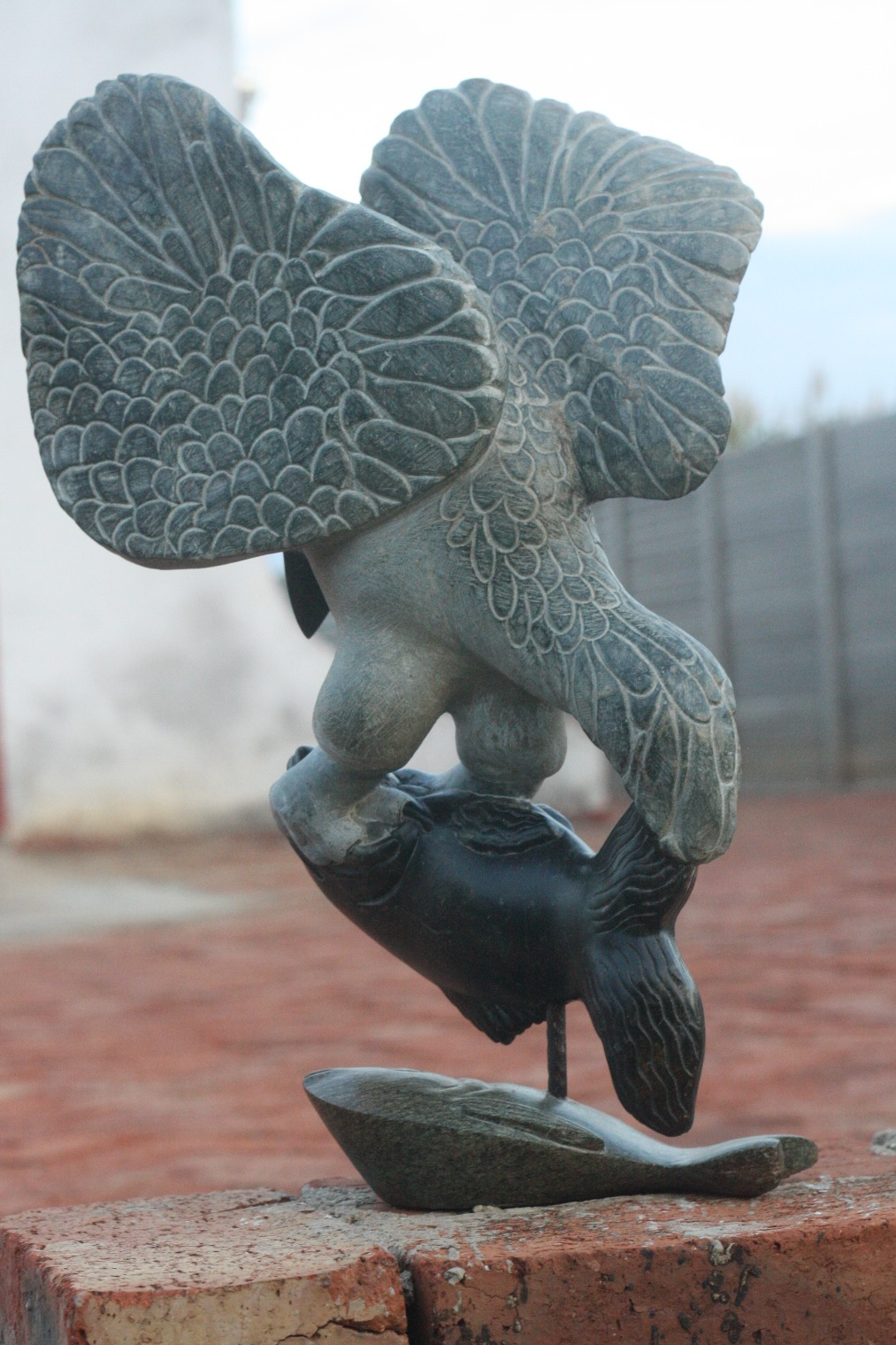 Fish Eagle - Stone Sculpture Made of Black Serpentine by Passmore Mashaya | Zimbabwe