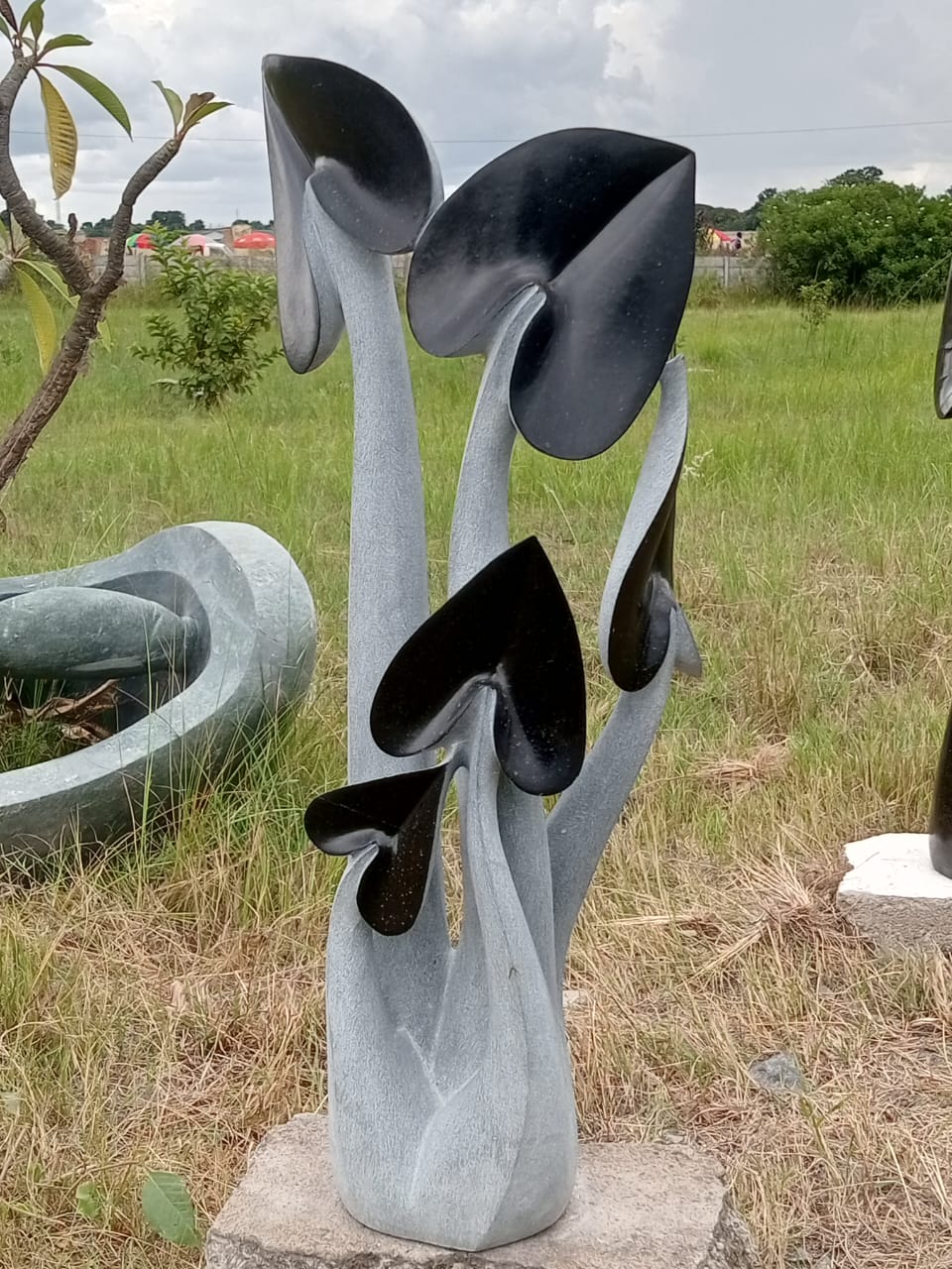 Family - Stone Sculpture Made of Springstone  by Josephat McKenzie | Zimbabwe