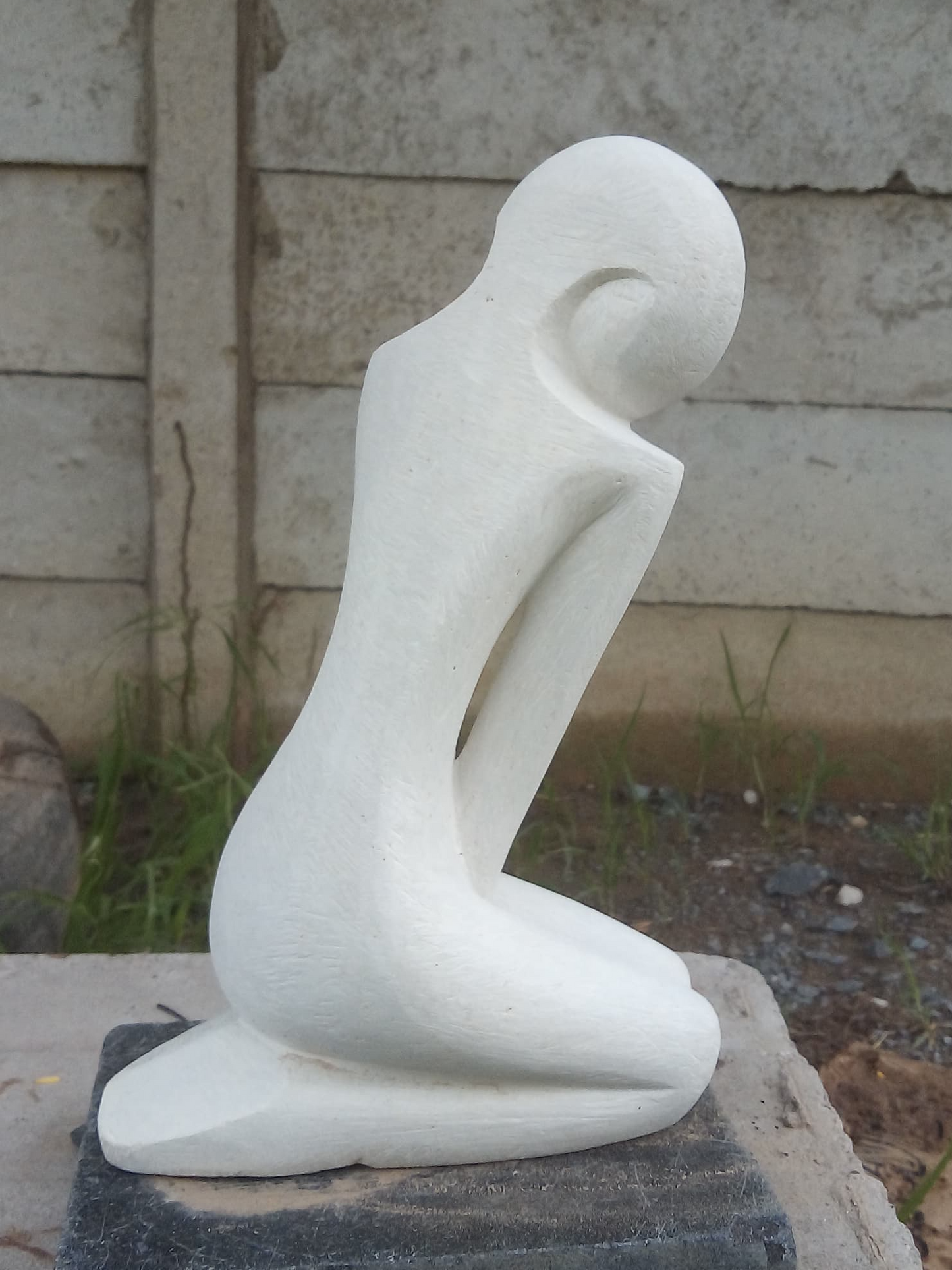 Modesty - Stone Sculpture Made of White Opal by Misheck Makaza | Zimbabwe