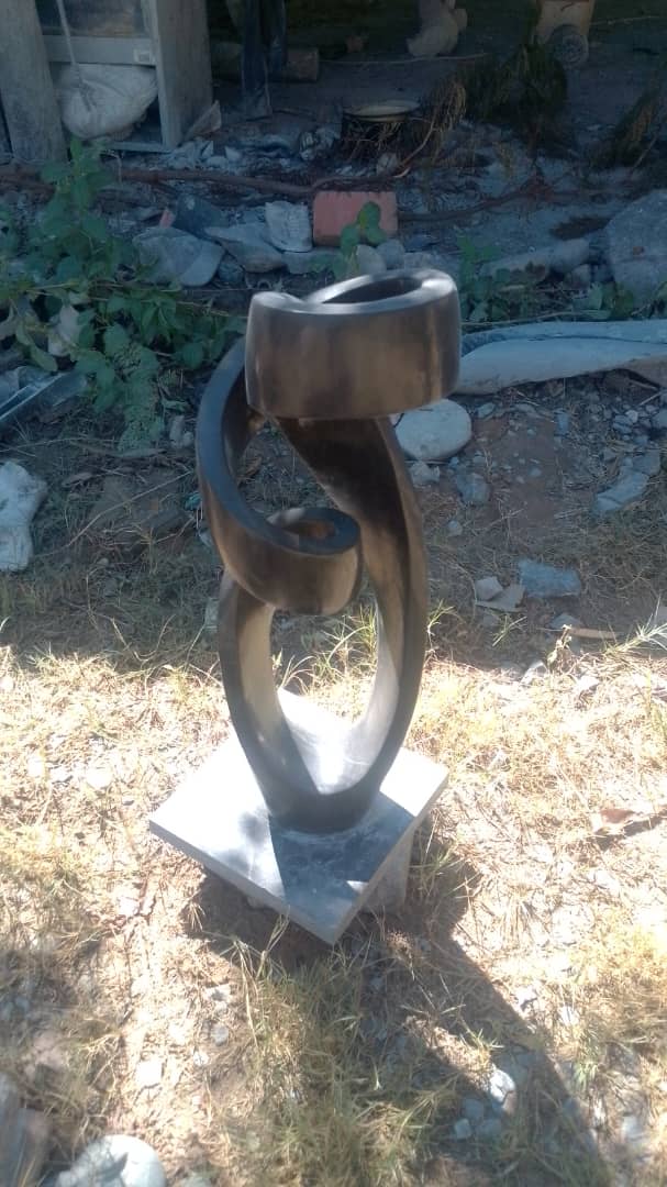 Model(Abstract) - Stone Sculpture Made of Springstone by Marshall Mangwere | Zimbabwe