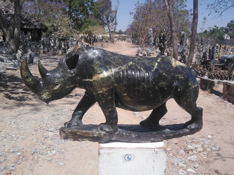 Rhino - Stone Sculpture Made of Leopard Rock by Ronny Nyamhunga | Zimbabwe