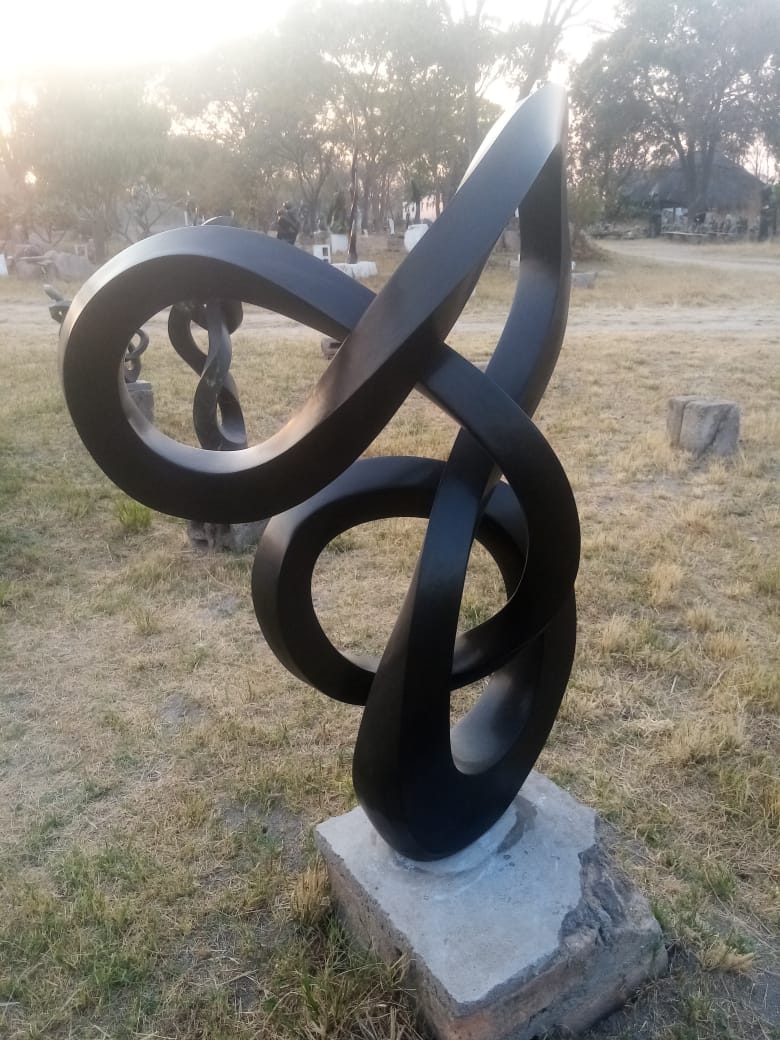 Secret Keeper - Stone Sculpture Made of Springstone by Blessng Mutukwa | Zimbabwe