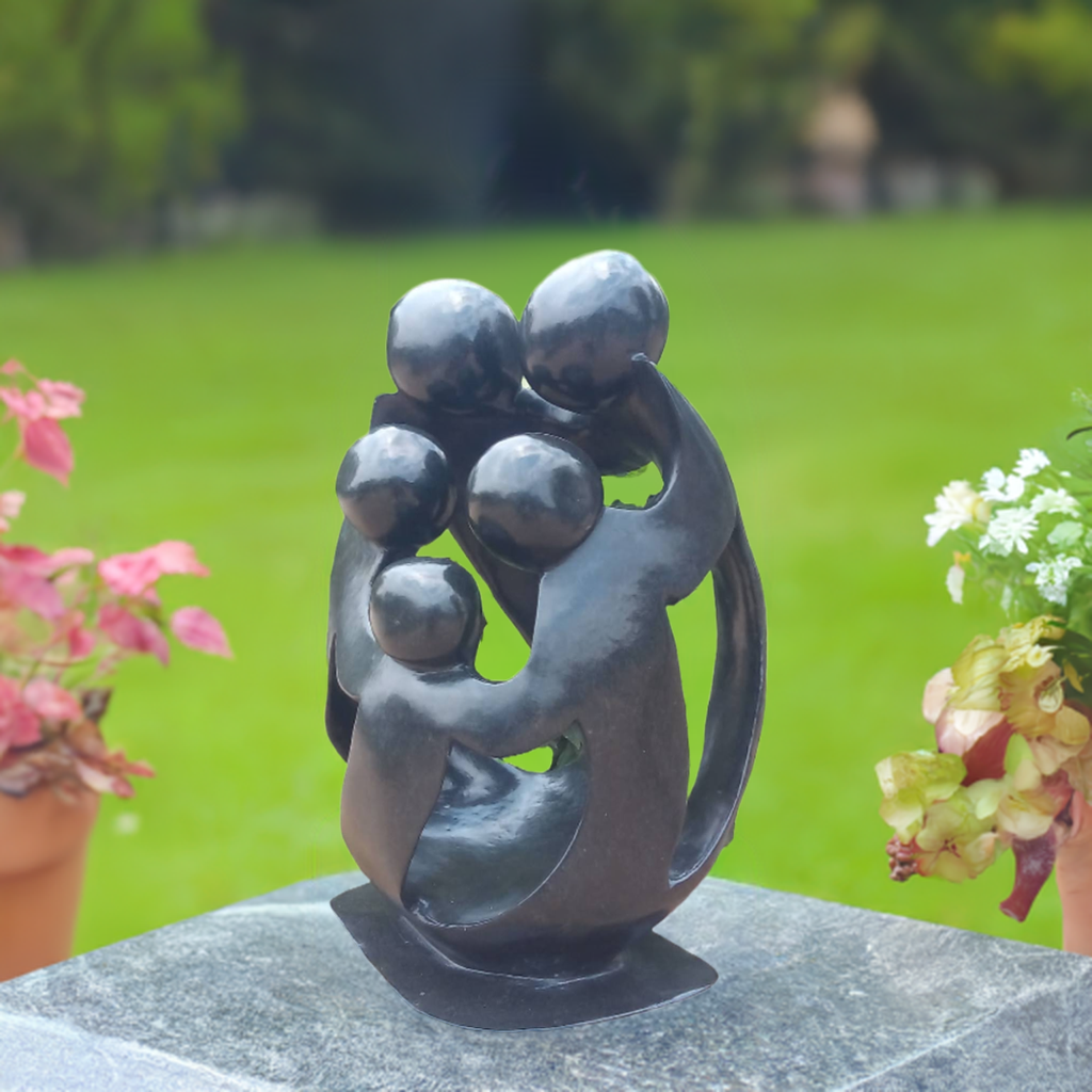 United Family - Stone Sculpture Made of Springstone by Nhota Rienda | Zimbabwe