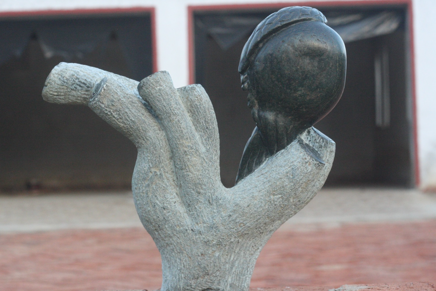 Preening Bird - Stone Sculpture Made of Springstone by Passmore Mashaya | Zimbabwe