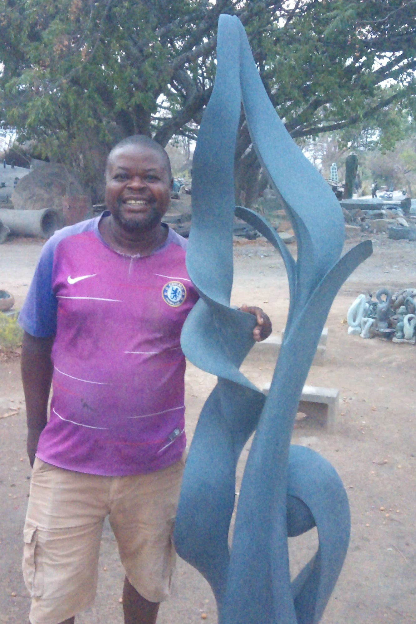 Eyes on Tomorrow - Stone Sculpture Made of Springstone by Onias Mupumha | Zimbabwe