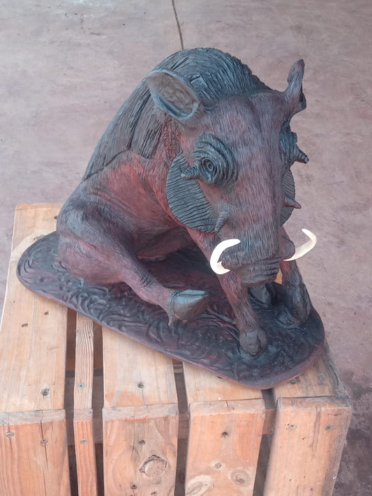 Warthog :  Carved from Ironwood by Killian Torovasei | Zimbabwe