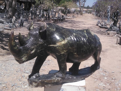 Rhino - Stone Sculpture Made of Leopard Rock by Rony Nyamhunga | Zimbabwe