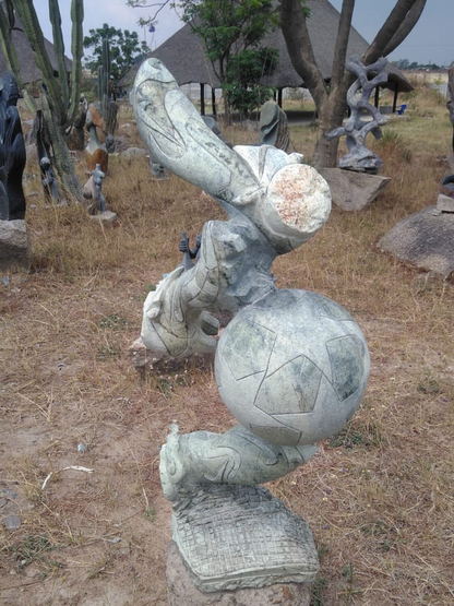 Soccer World Cup - Stone Sculpture Made of Leopard Rock by Ambrose Shambare| Zimbabwe