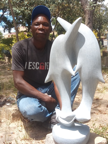 Happy Times - Stone Sculpture Made of Springstone by Morgan Chijumani | Zimbabwe