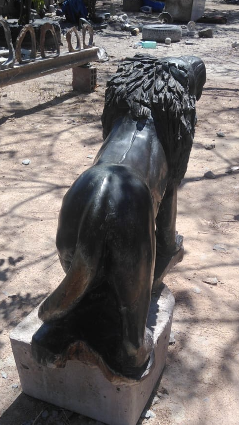 Roaring Lion - Stone Sculpture Made of Springstone by Rony Nyamhunga | Zimbabwe