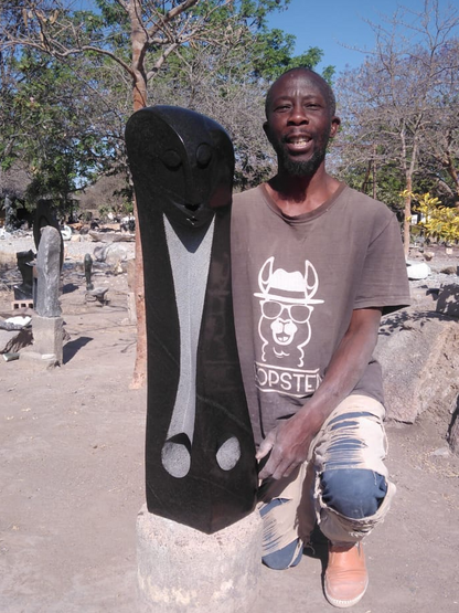 Resting Bachelor - Stone Sculpture Made of Springstone by Antony Masamba | Zimbabwe