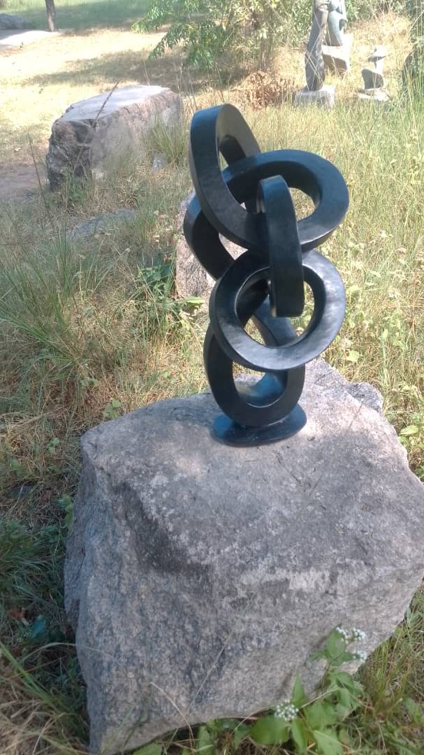 Bond of Love - Stone Sculpture Made of Springstone by Lawrence Tirivangani | Zimbabwe