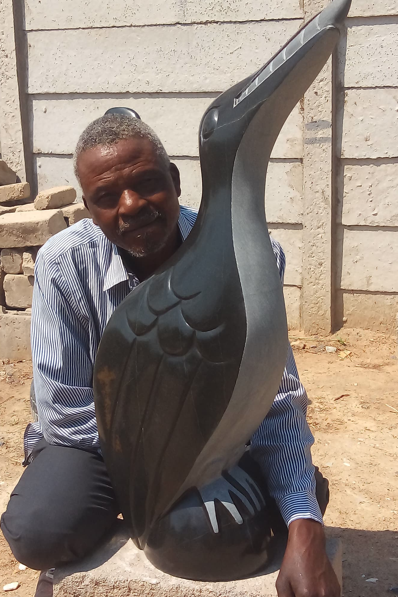 Early Bird - Stone Sculpture Made of Springstone by Patrick Fredy | Zimbabwe