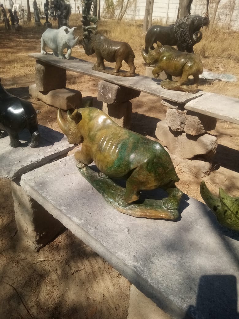 Charging Rhino - Stone Sculpture Made of Verdite by Ronny Nyamhunga | Zimbabwe