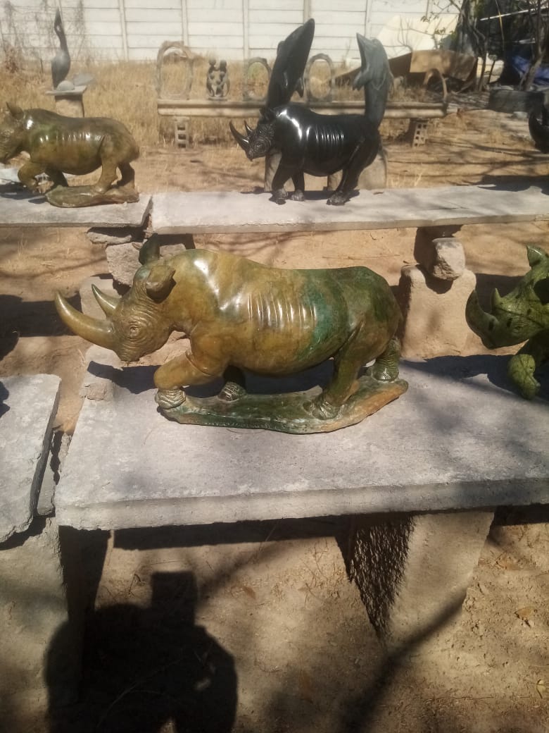 Charging Rhino - Stone Sculpture Made of Verdite by Ronny Nyamhunga | Zimbabwe