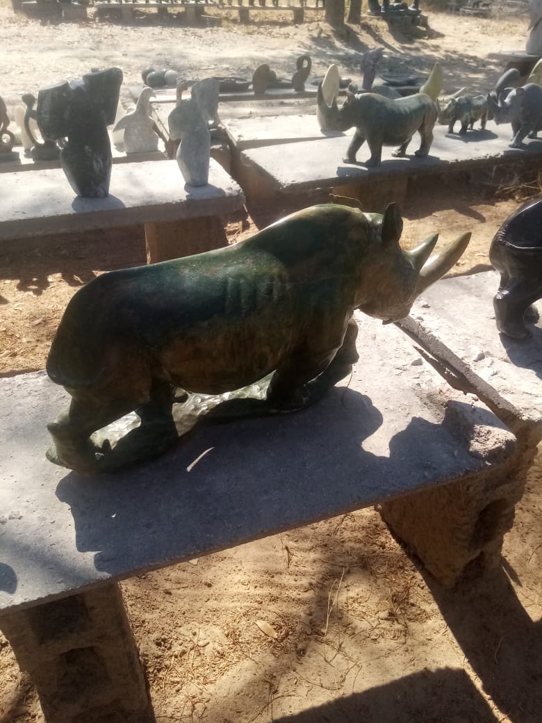 Charging Rhino - Stone Sculpture Made of Verdite by Ronny Nyamhunga | Zimbabwe