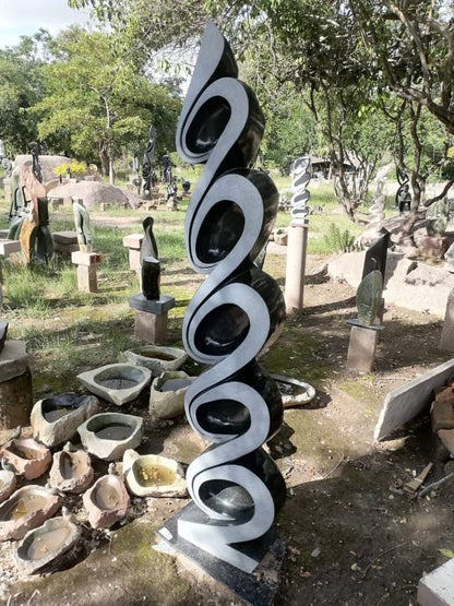 Climber - Stone Sculpture Made of Springstone by Ishmael Chitiyo | Zimbabwe