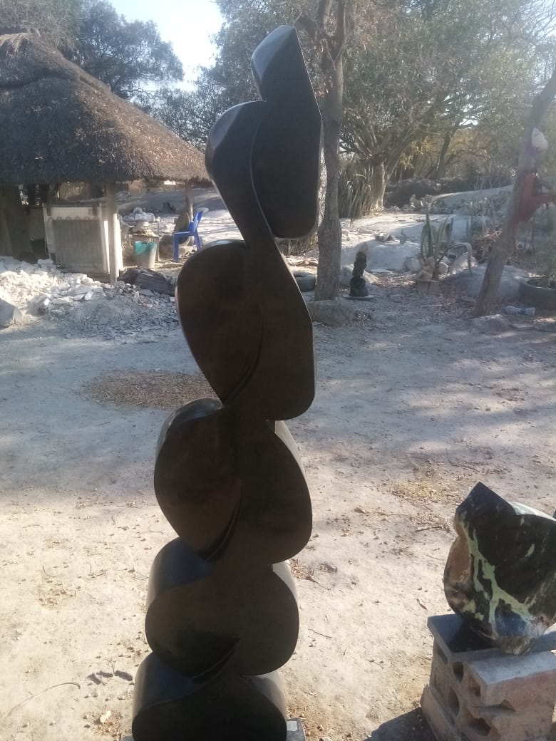 Climber - Stone Sculpture Made of Springstone by Ishmael Chitiyo | Zimbabwe