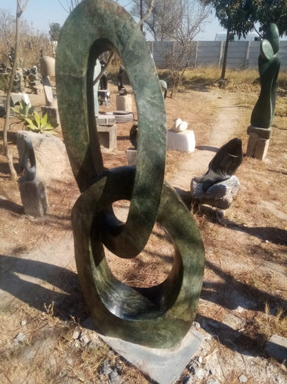Connected - Stone Sculpture Made of Cobalt Stone by Pheoleen Gandari | Zimbabwe