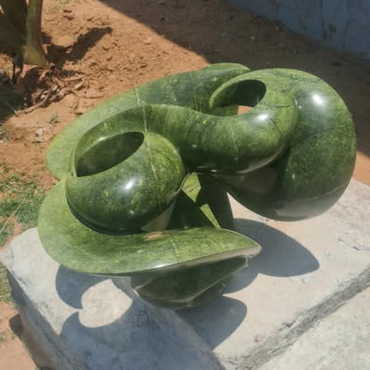 Elephant Flower- Abstract Stone Sculpture Made of Avocado Stone by James Phiri | Zimbabwe