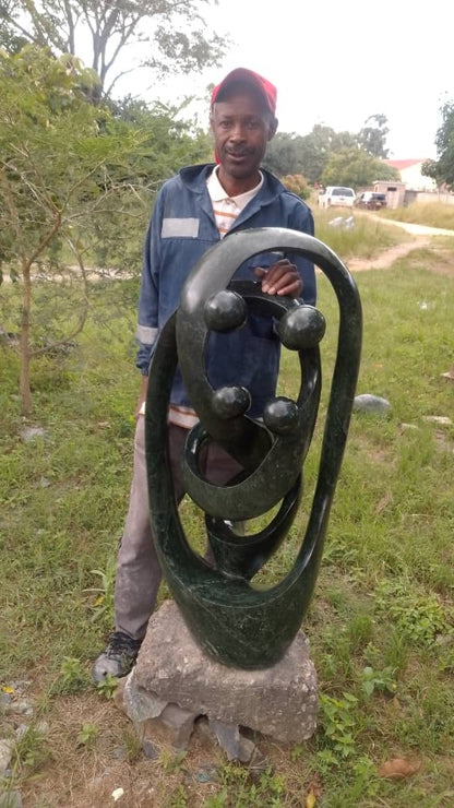 Family Unit - Stone Sculpture Made of Opal Stone by Taurai Mutigwa | Zimbabwe