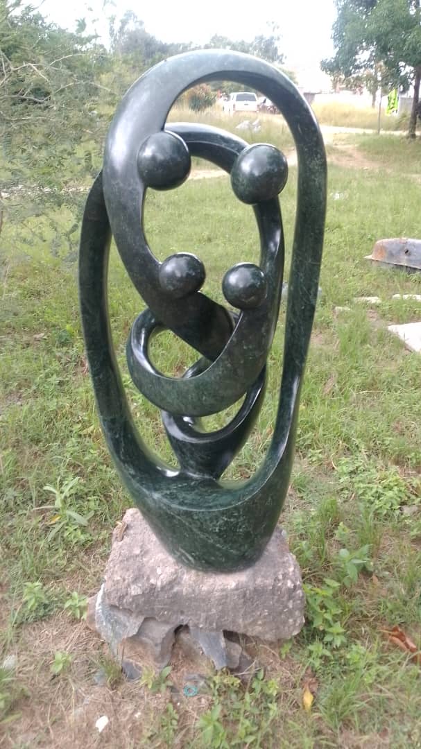 Family Unit - Stone Sculpture Made of Opal Stone by Taurai Mutigwa | Zimbabwe