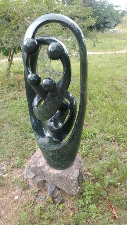 Family Unit - Stone Sculpture Made of Opal Stone by Taurai Mutigwa | Zimbabwe
