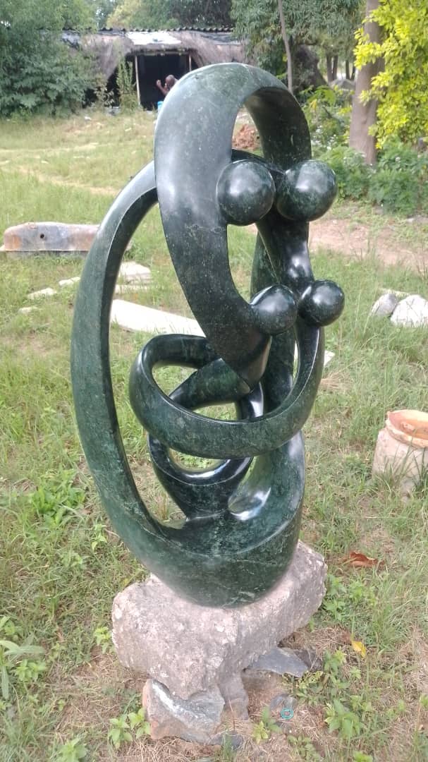 Family Unit - Stone Sculpture Made of Opal Stone by Taurai Mutigwa | Zimbabwe