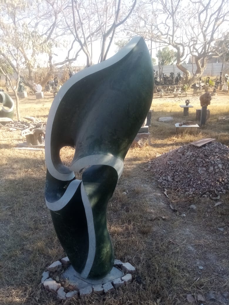 Focul Point - Stone Sculpture Made of Springstone by Davis Sibanda | Zimbabwe