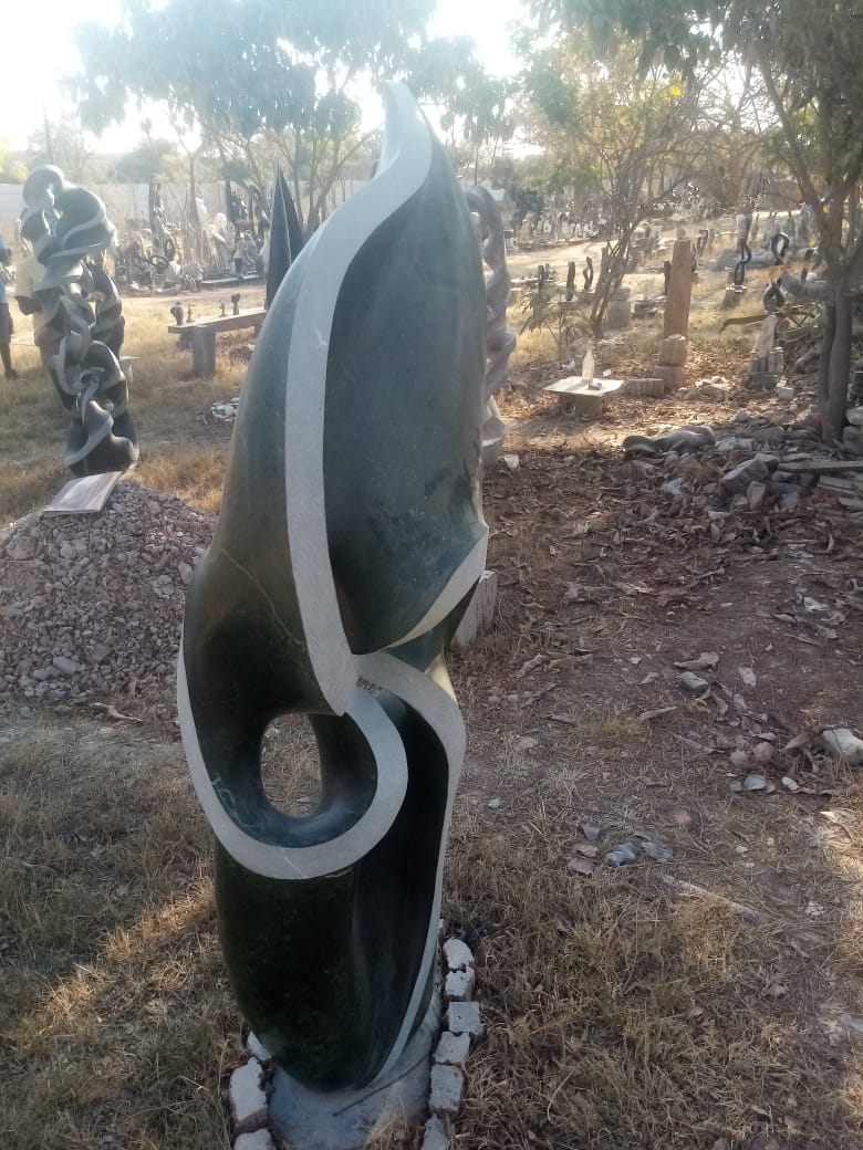 Focul Point - Stone Sculpture Made of Springstone by Davis Sibanda | Zimbabwe