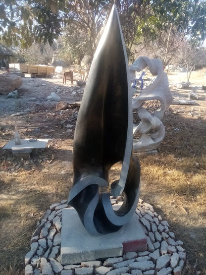 Germination - Stone Sculpture Made of Springstone by Davis Sibanda | Zimbabwe