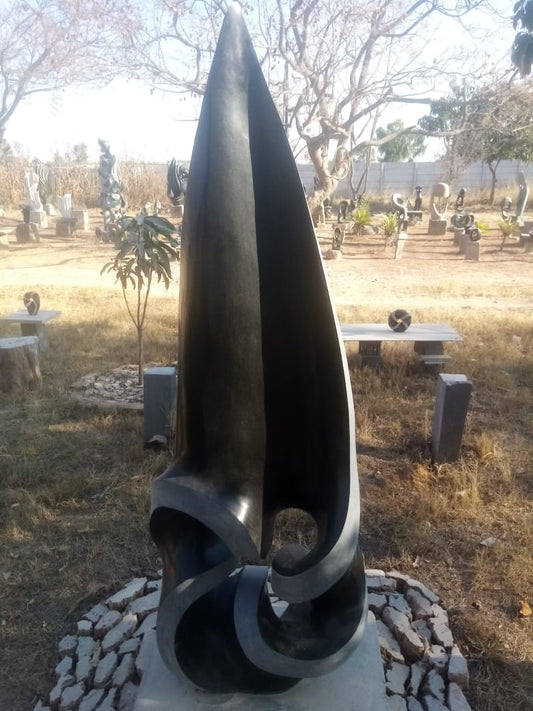 Germination - Stone Sculpture Made of Springstone by Davis Sibanda | Zimbabwe