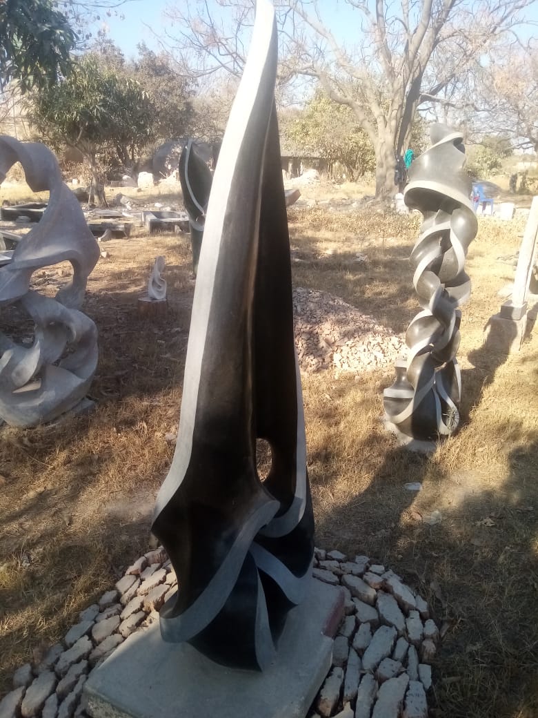 Germination - Stone Sculpture Made of Springstone by Davis Sibanda | Zimbabwe