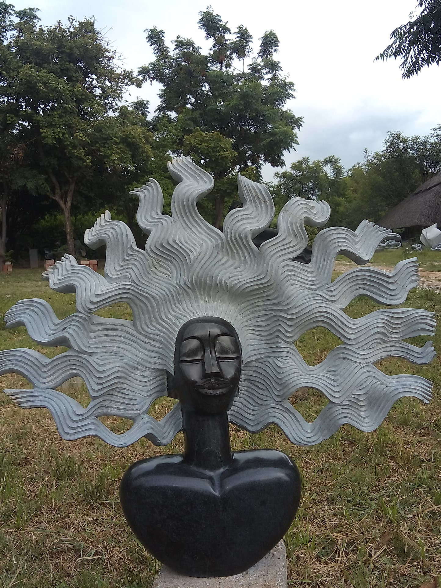 Blown Away - Stone Sculpture Made of Springstone by Godfrey Matangira | Zimbabwe