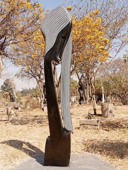 Graduation Day - Stone Sculpture Made of Springstone by Sydney Majengwa | Zimbabwe