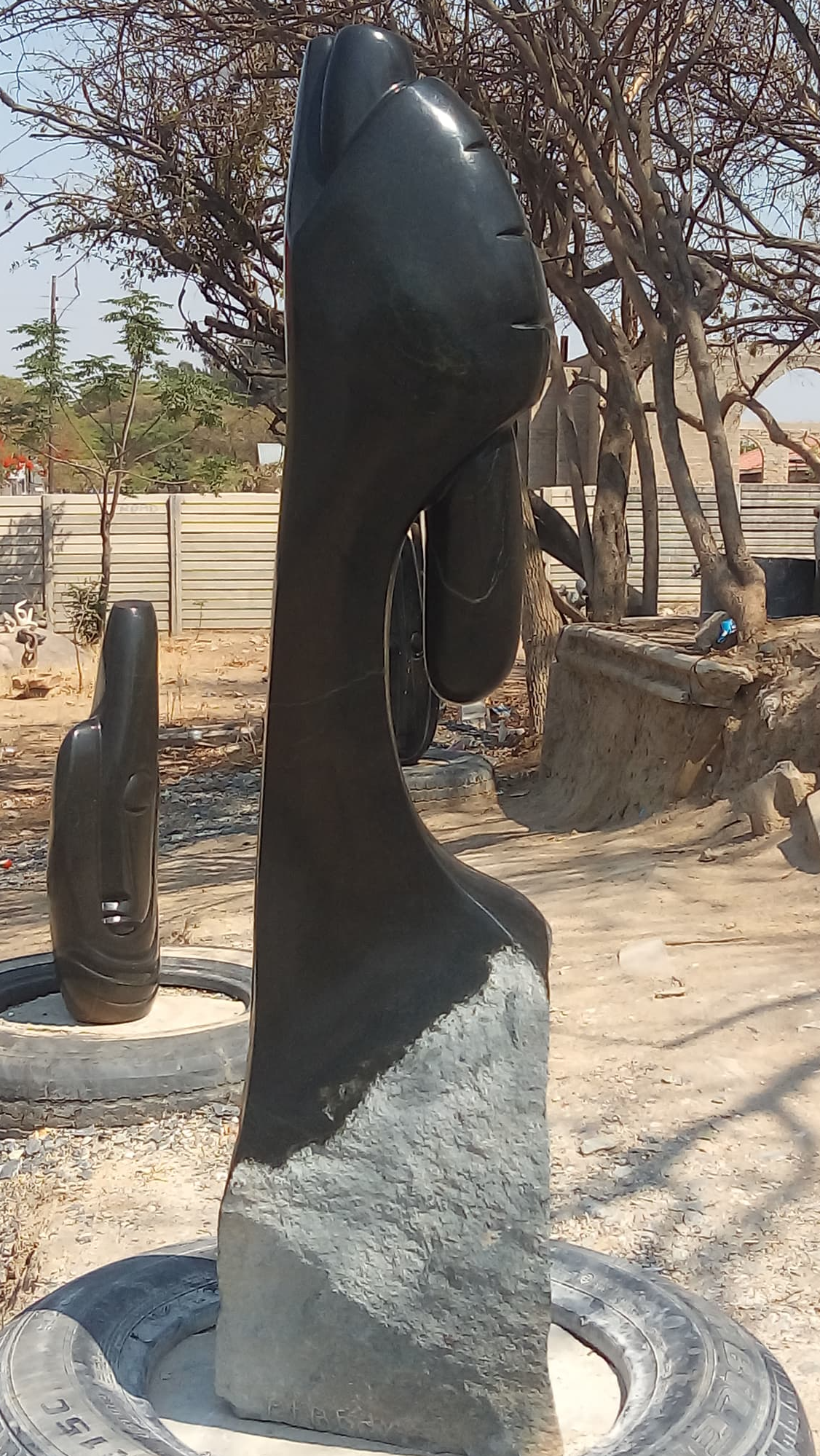 Grip of Hope - Stone Sculpture Made of Springstone by Patrick Fredy | Zimbabwe