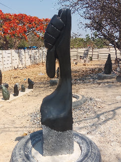 Grip of Hope - Stone Sculpture Made of Springstone by Patrick Fredy | Zimbabwe