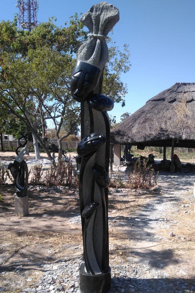 Famly Bond - Stone Sculpture Made of Springstone by Alfred Mutuke | Zimbabwe