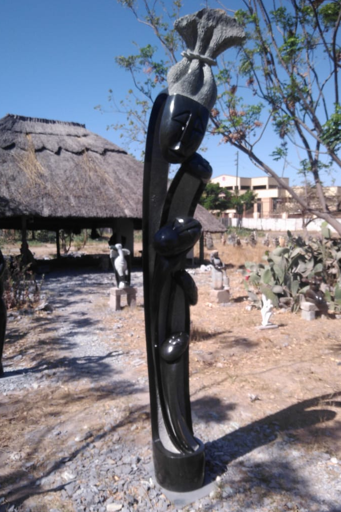 Famly Bond - Stone Sculpture Made of Springstone by Alfred Mutuke | Zimbabwe