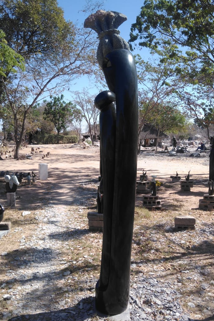 Famly Bond - Stone Sculpture Made of Springstone by Alfred Mutuke | Zimbabwe