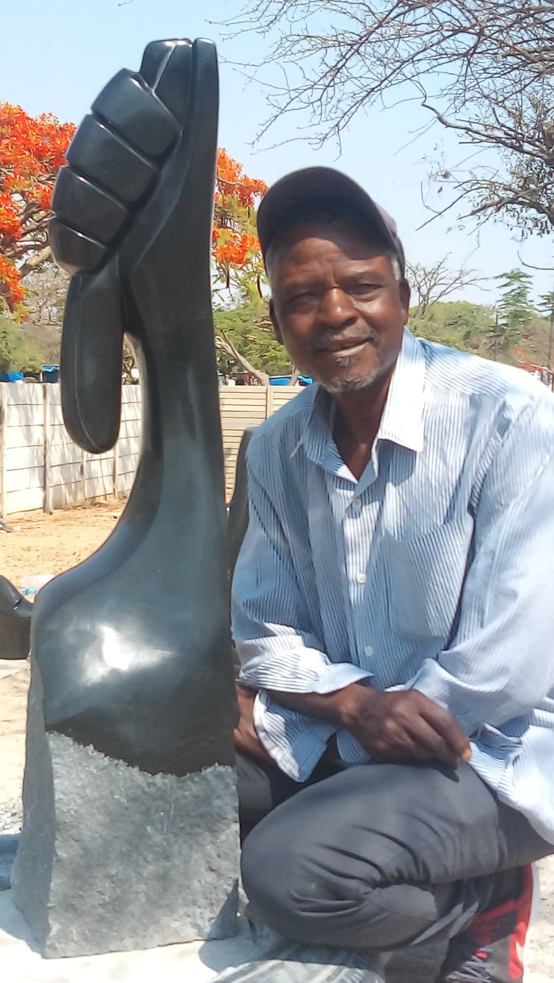 Grip of Hope - Stone Sculpture Made of Springstone by Patrick Fredy | Zimbabwe