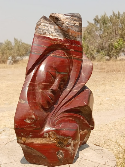 Without A Care - Stone Sculpture Made of Red Jasper by Batsirai Tago | Zimbabwe