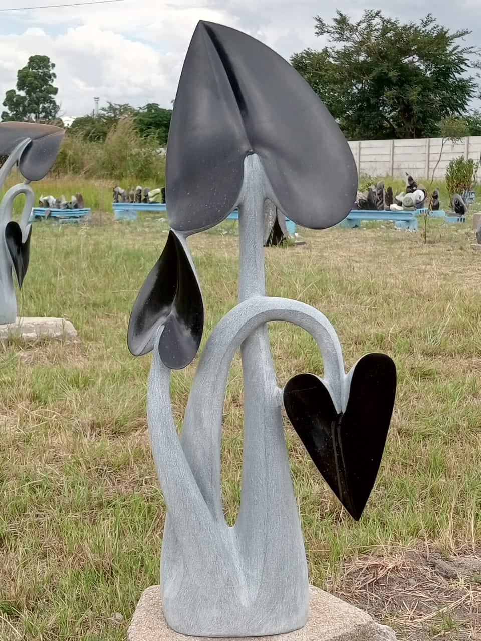 New Season - Stone Sculpture Made of Springstone  by Josephat McKenzie | Zimbabwe