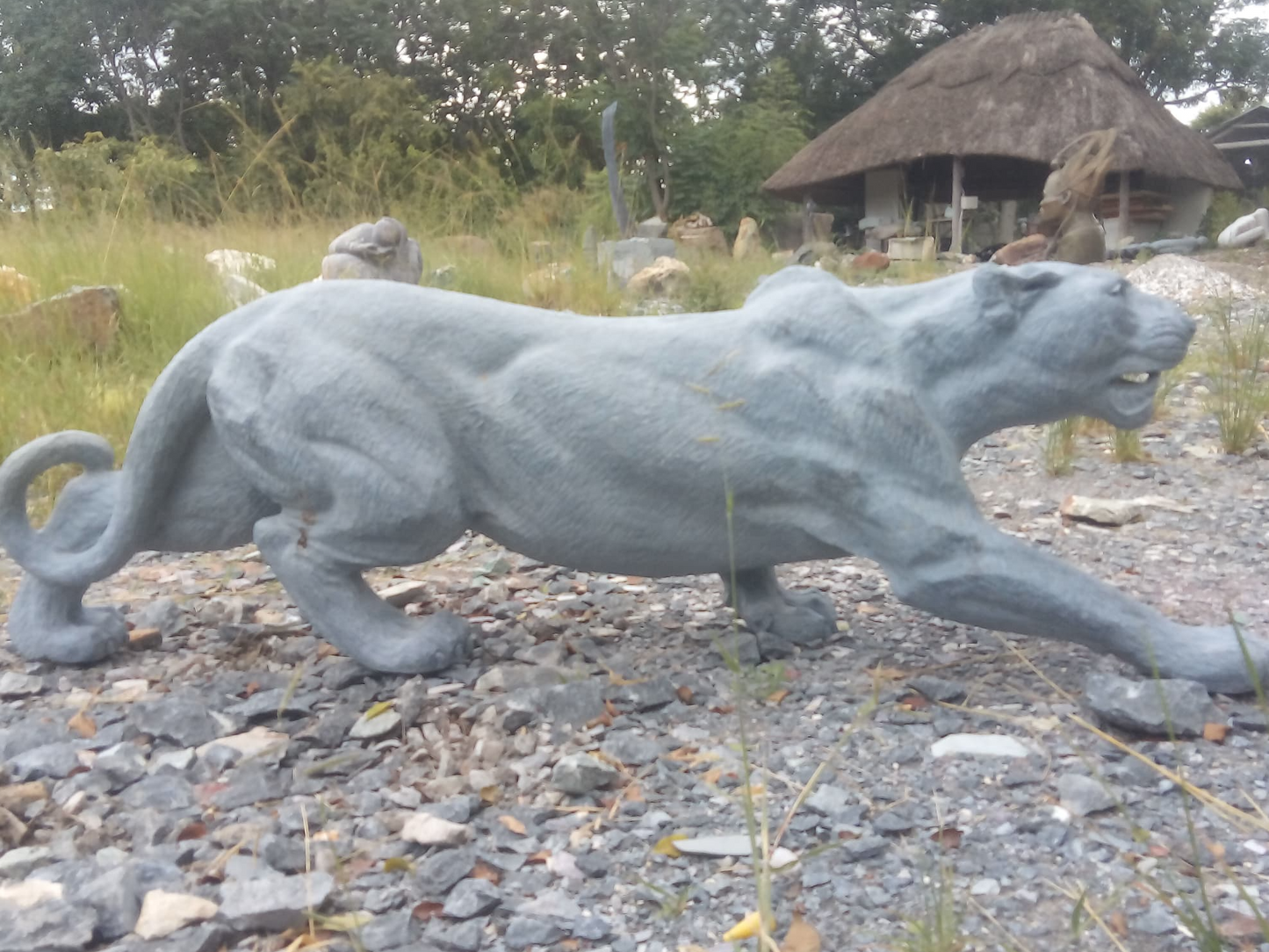 On The Prowl - Stone Sculpture Made of Springstone by Farai Tandi | Zimbabwe