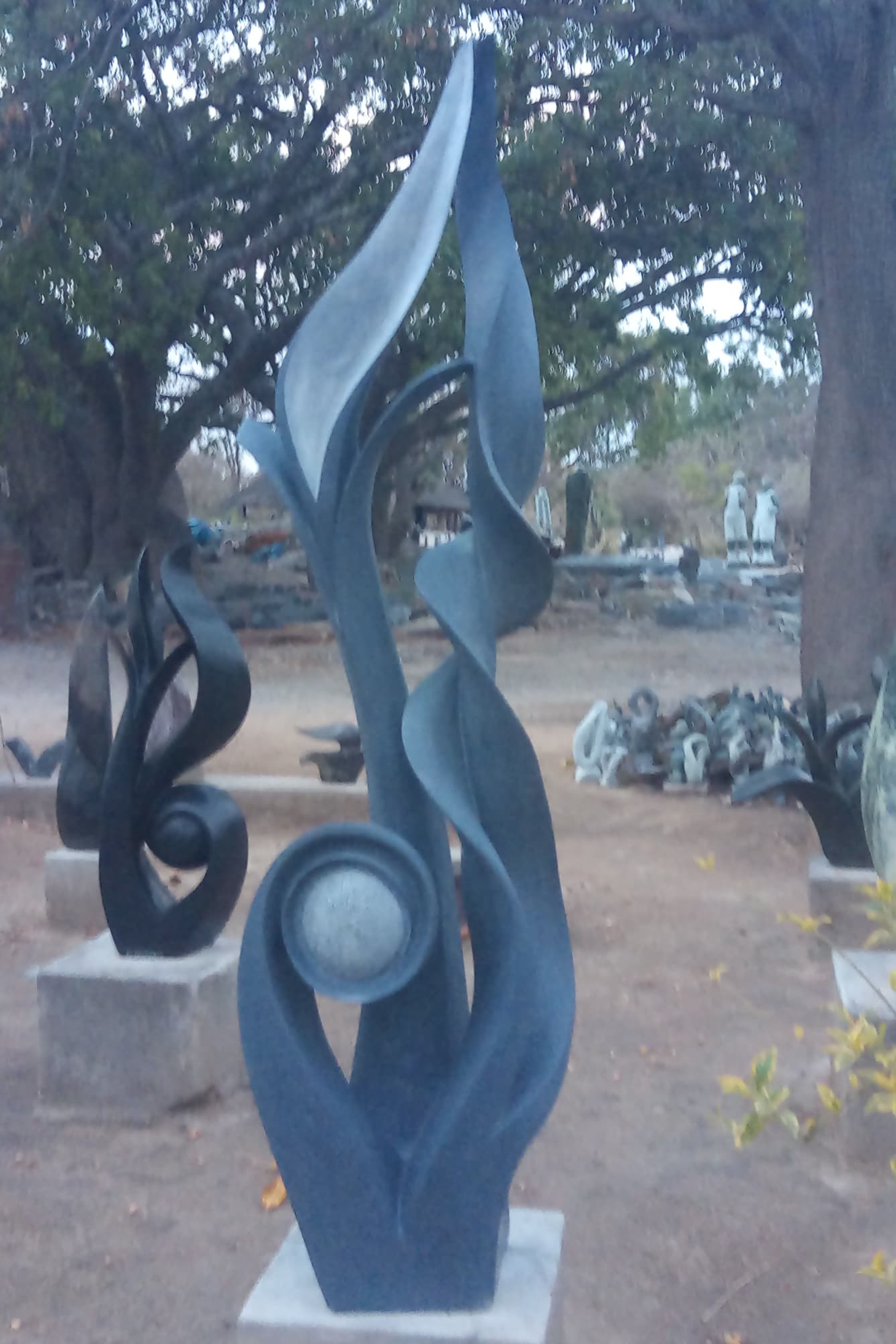 Eyes on Tomorrow - Stone Sculpture Made of Springstone by Onias Mupumha | Zimbabwe