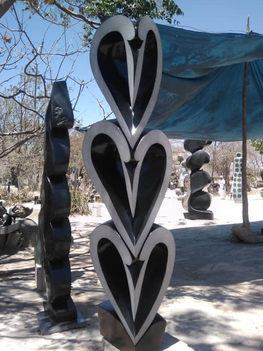 Love Birds - Stone Sculpture Made of Springstone by Ishmael Chitiyo Jnr | Zimbabwe