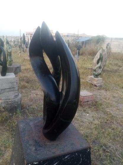 Lovers Delight - Stone Sculpture Made of Leopad Rock by Livingstone Matambo | Zimbabwe